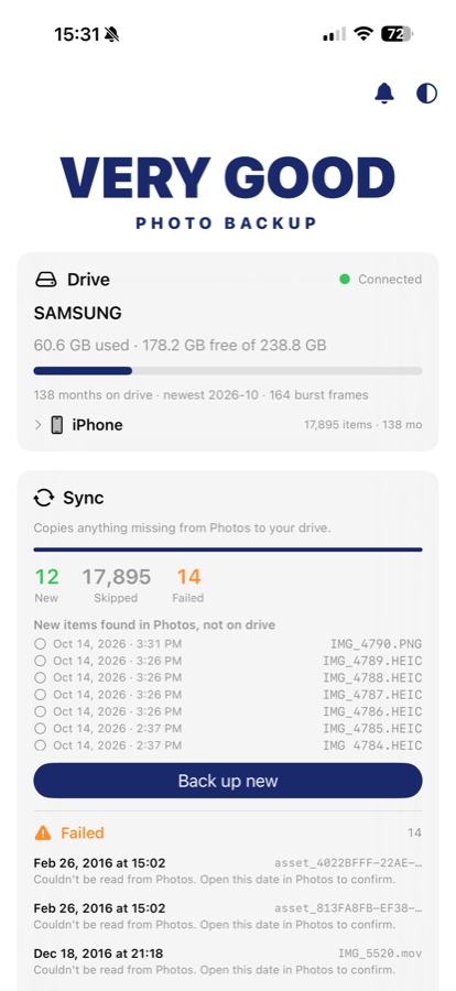Backup results screen showing new, skipped, and failed counts with a list of items